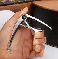 Wholesale New 3-in-1 Pickbox and Zinc Alloy Capo Tunering