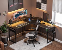 Échantillon gratuit DDP Drop 1 pièce Bureau de jeu noir en forme de L avec lumières LED Prises de courant Bureau d'angle avec porte-gobelet