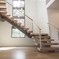 Escalier préfabriqué à poutre centrale simple en forme de L, sur mesure pour appartement et loft