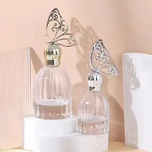 Pequeña tapa de mariposa vacía, embalaje privado para el cuidado de la piel, botella de vidrio de perfume, color personalizado, 30ml, 60ml, gran oferta