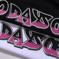 Kaos Oblong Life Hustlers Motif Piring Terbang dengan Tulisan Berhias Rhinestone Pink Hotfix dan Desain 'No Days Off' di Bagian Belakang