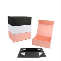 Boîte cadeau magnétique noire en papier rigide pliable mat avec structure pliable à plat pour l'emballage de cadeaux de luxe pour hommes