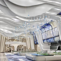 Lustre ANNO Blue Drop avec design flottant multi-niveaux, suspension personnalisée en grappe pour centre de vente immobilière