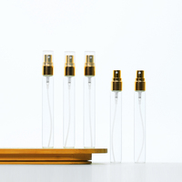 Emballage de soins de la peau de luxe Petites bouteilles en verre avec pulvérisateur en plastique doré 2ml 3ml 5ml 10ml Bouteille de parfum ronde