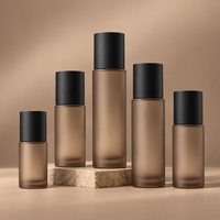 Emballage cosmétique personnalisé HuiFeng, flacon en verre ambré givré de 100 ml avec couvercle noir et pompe à crème blanche