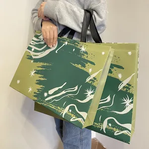 कस्टम लोगो पर्यावरण-अनुकूल शॉपिंग हैंडबैग के साथ थोक फैक्टरी-सोर्स रीसाइक्लेबल गैर-बुना कपड़ा बैग