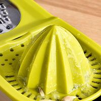 Presse-agrumes créatif multifonctionnel 2-en-1 Gadget de cuisine Presse-agrumes au citron Fruit au melon Râpe à fil