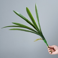 Vente en gros d'usine : Feuilles artificielles vertes en vrac, tiges de verdure, décorations de feuillage artificiel pour plantes en pot et décoration intérieure