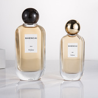Flacon pulvérisateur de parfum pour femme en verre transparent de haute qualité, cylindrique, vide, 50 ml, 100 ml, avec bouchon rond – Vente directe usine
