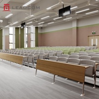 Chaise de bureau étudiante relevable Leadcom L-E10 en plastique PP, modulaire et connectable, pour salles de cours universitaires et scolaires