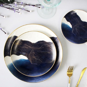Service de vaisselle en porcelaine fine motif ciel étoilé bleu – Assiettes en céramique pour décoration de table lors d'événements et fêtes en extérieur - Product Image 1