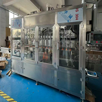 Machine de remplissage automatique d'huile lubrifiante avec machine de bouchage et d'étiquetage pour bidons en plastique d'huile moteur, machine de remplissage d'huile moteur