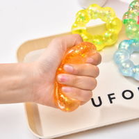 Bracelet anti-stress transparent en forme de beignet Colorfour, balle à presser, jouet de décompression pour enfants et adultes, cadeau aléatoire