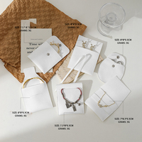 Vente en gros d'ensemble de boîtes d'emballage de bijoux boîte à bijoux en deux parties avec pochette à bouton-pression et sac en velours pour le stockage