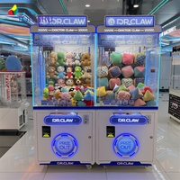 Machine à griffes bleue avec accepteur de billets, jeu d'arcade, pousse-pièces, mini jouet, attrapeur de peluches, jeu d'arcade, attrapeur de poupées, prix à gagner, à vendre