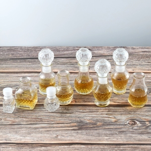 50 ml Glass Mini Liquor Bottles with Glass Lid Small Glass Alcohol Bottles 1.7 oz Mini Wine Bottles Reusable