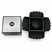 Emballage cosmétique réutilisable personnalisé noir et argent, boîte en papier rigide avec couvercle et base, insert en EVA recouvert de velours et gaufrage