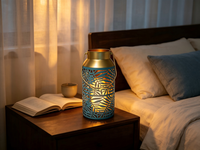 Lanterne en métal bleu sarcelle à découpes en forme de feuille, lanterne décorative portable en fer avec bordure dorée, option d'éclairage LED personnalisable