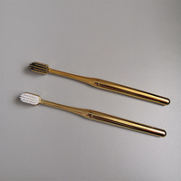 Vente en gros pas cher de haute qualité OEM logo personnalisé maison 144 or rose hôtel brosse à dents manuelle à poils souples Ultrasoft