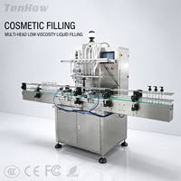 Machine de remplissage cosmétique à 6 têtes pour liquides à faible viscosité, idéale pour les flacons de lotion, de sérum, de gel et de liquides.