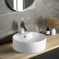 Lavabo en céramique moderne à montage monotrou pour salle de bain, idéal pour hôtels et comptoirs