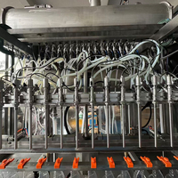 Machine de remplissage automatique de détergent liquide, machine de bouchage, machine d'étiquetage, machine de remplissage de nettoyant pour liquides et moussants