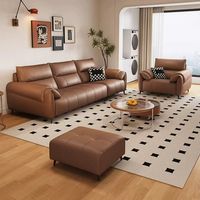 Sofá Minimalista de Estilo Italiano, de Cuero Genuino de Primera Capa, Modelo Tanya, con Respaldo Alto, Patas Metálicas Móviles, para Espacios Modernos