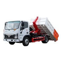 Camion benne hydraulique à bras articulé : Opération multi-conteneurs pour un transfert de déchets efficace et une logistique économique