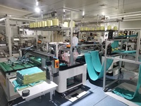 Machine à coudre à quatre côtés pour serviettes en microfibre à automatisation intelligente, idéale pour les usines de serviettes en bambou et en fibres recyclées