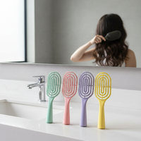 A16 Meilleure vente Outil de coiffure Peigne de massage à coussin d'air à dents en nylon, manche en plastique, ventilation creuse, dents flexibles