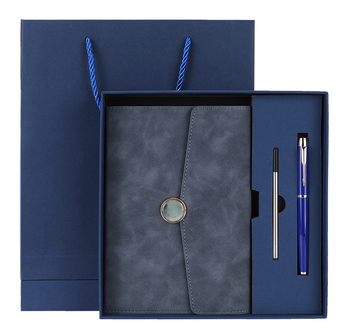 Cuaderno azul + bolígrafo