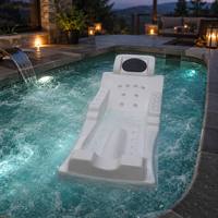 Lit de massage hydrothérapeutique en acrylique blanc avec 7 jets, contour ergonomique, jets chromés et appui-tête rembourré