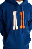 Ensemble de sport pour hommes avec sweat à capuche et broderie personnalisée bleu sarcelle, fabriqué par Caoton Fair à Guangzhou
