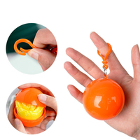 Poncho de Pluie Portable Pas Cher en Gros, Poncho de Pluie Jetable Transparent en PE, Poncho de Pluie en Forme de Boule pour Porte-clés, Imperméable