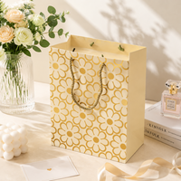 Sac cadeau blanc à pois avec poignée en corde blanche, papier de luxe pour mariage et affaires, logo personnalisé disponible