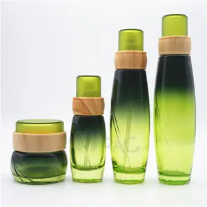 Botella de vidrio personalizada de lujo para cosméticos, loción con bambú
