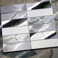 Carreaux de mosaïque en acier inoxydable argenté de luxe, finition miroir 3D, carreaux métalliques pour les projets d'intérieur commercial et d'ingénierie moderne