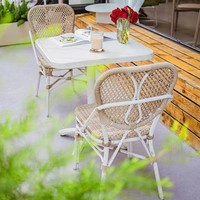 Chaise de bistrot française en rotin de style antique pour café