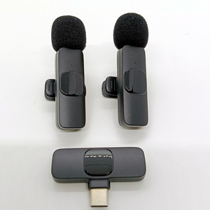 Kit <span class=keywords><strong>de</strong></span> Microphone sans Fil K9-Mini (Lot <span class=keywords><strong>de</strong></span> 2) pour Vlogging TikTok, Facebook, <span class=keywords><strong>YouTube</strong></span> – Micro-Cravate sans Fil - Product Image 1