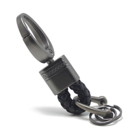 Offre Spéciale manuel tressé à la main corde argent alliage de zinc métal étiquette ronde tressé cuir cordon or cuir sangles tresse porte-clés