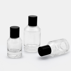 Bán buôn sang trọng trong suốt chai nước hoa thủy tinh 30ml 50ml <span class=keywords><strong>100ml</strong></span> xi lanh hình tròn rỗng với phun và nắp màu đen - Product Image 1