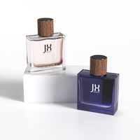 Vente en gros de flacons pulvérisateurs de parfum vides de 50ml avec logo personnalisé et professionnel avec bouchon en bois