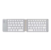 Keyboard Bluetooth portabel, tipis dan ringan, nirkabel mini lipat dua sistem umum untuk berbagai sistem