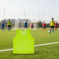 Vente en gros d'usine, logo personnalisé, 100% fibre de polyester, respirant et à séchage rapide, gilet d'entraînement de football pour enfants et adultes