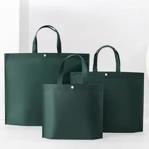 Tas belanja non-tenun buatan kustom dengan kancing gelap logo pakaian ramah lingkungan dan tas pembawa kemasan yang dipertebal