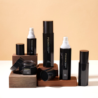 Ensemble de flacons en verre cylindriques noirs brillants personnalisés de luxe 30g/50g/30ml/100ml/120ml avec bouchon argenté ou doré pour l'emballage des soins de la peau