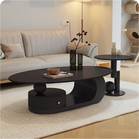 Table basse moderne haut de gamme de style crème, luxe léger, petite taille, style français, ovale, en dalle de pierre frittée