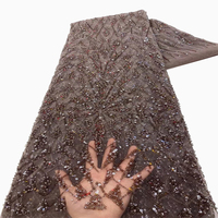 Tissu en dentelle perlée NI.AI le plus populaire, ruban de dentelle brodé de perles, tissu en dentelle à sequins brillants pour robe de mariée et de soirée