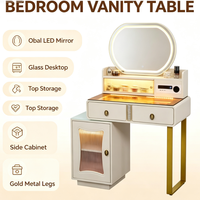 Ensemble de table de maquillage avec miroir ovale LED blanc, table de maquillage avec armoire latérale et pieds dorés pour petite chambre