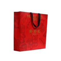 Top Handle Eco-friendly Kraft Paper Bags Custom Logo Printing Luxury Packaging Coated Fancy Paper Embossed Custom Color